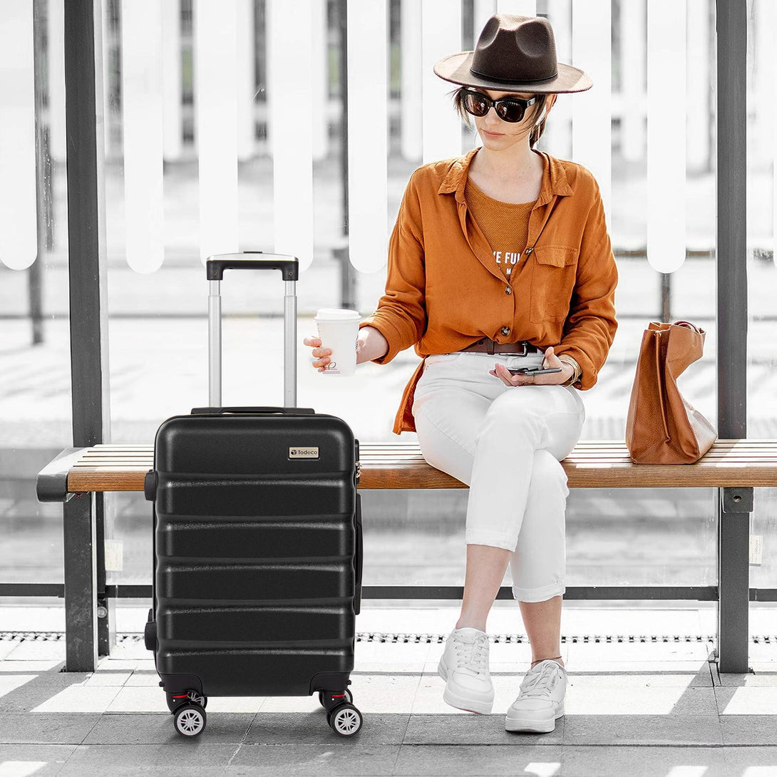 Todeco-Cabin-Suitcase-56cm-Rigid-and-Lightweight-ABS-PC-Lightweight-Carry-on-Suitcase-with-Hard-Shell-Travel-Suitcase-with-4-Double-Wheels-56x36x22cm-Black