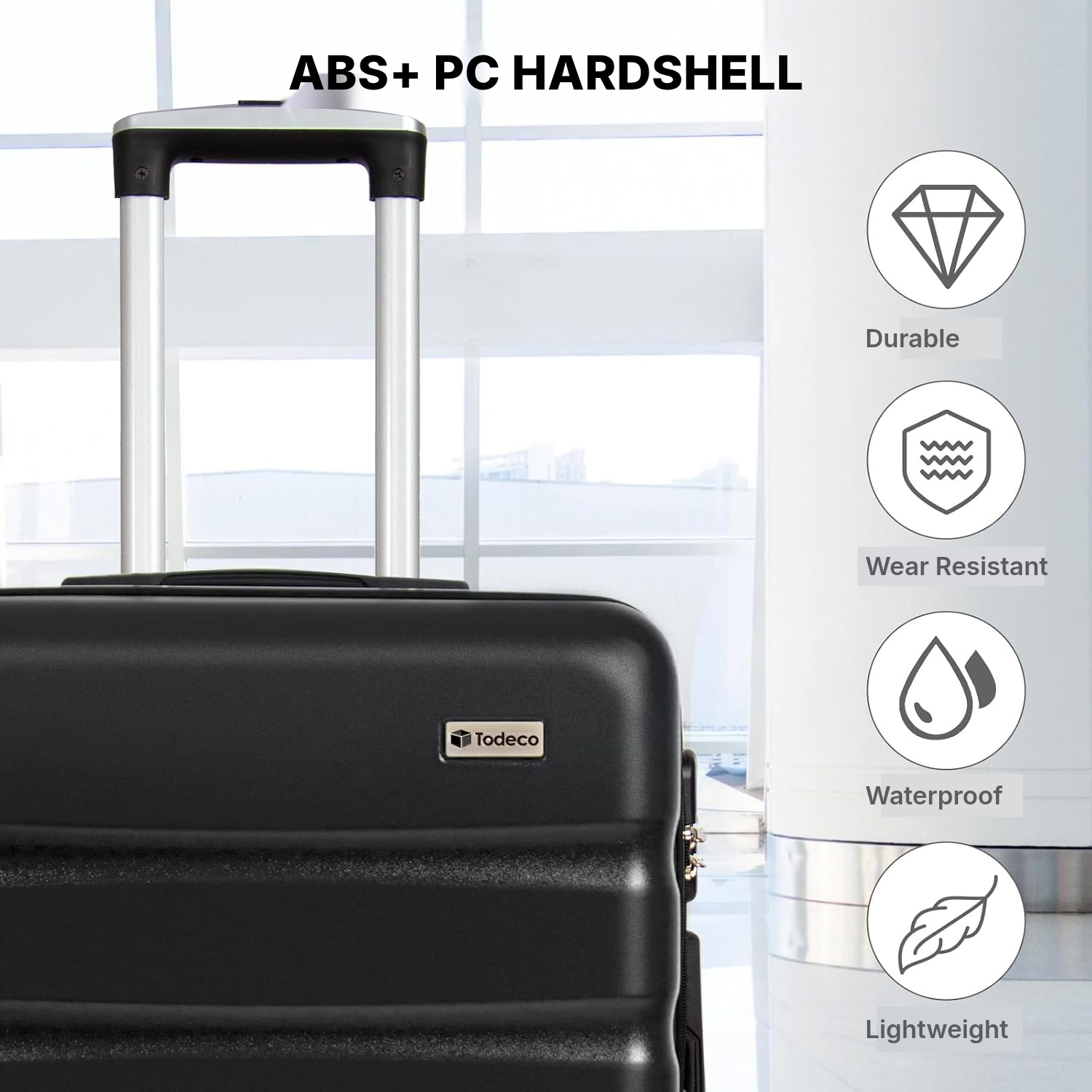Medium Black Hardshell Suitcase – 67 cm — 2